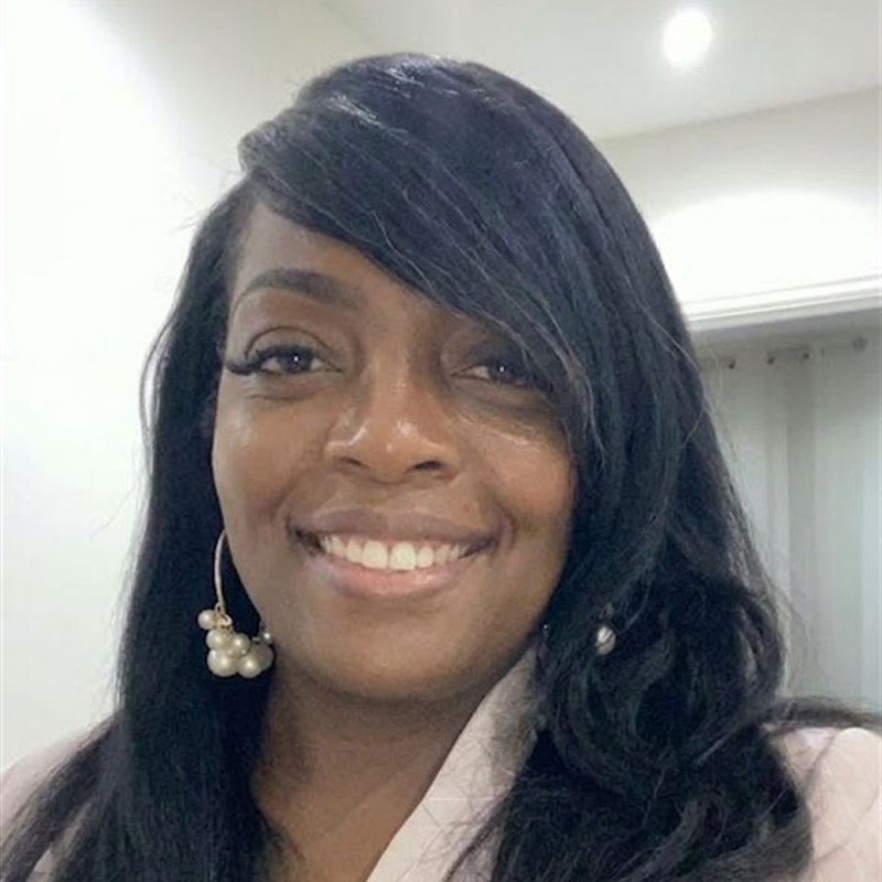 Loretta Thompson, smiling